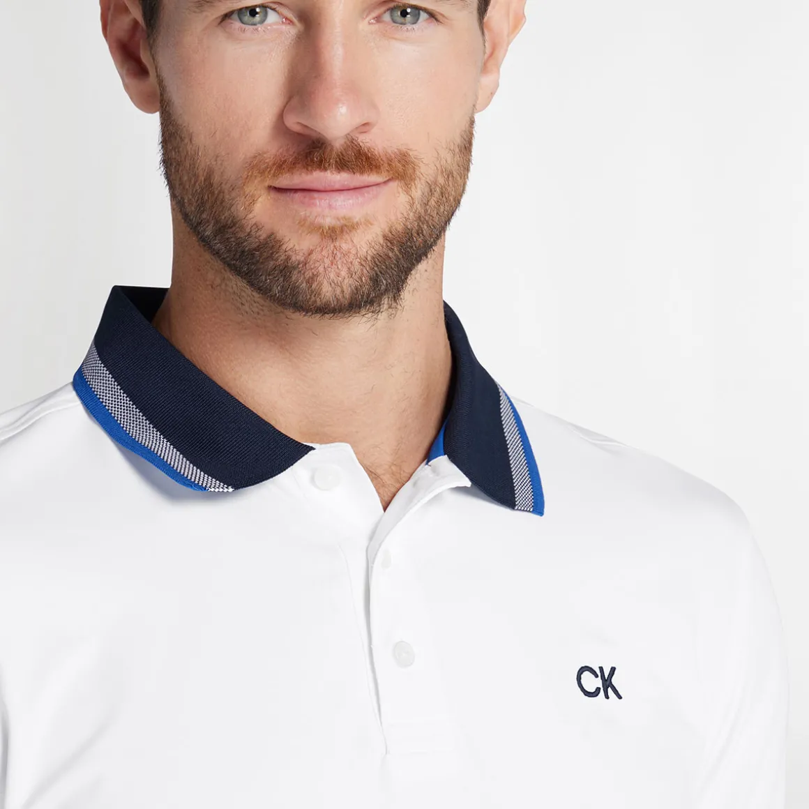 calvin_klein_mens_tech_je_2.webp Calvin Klein Men's Tech Jersey Golf Polo Shirt