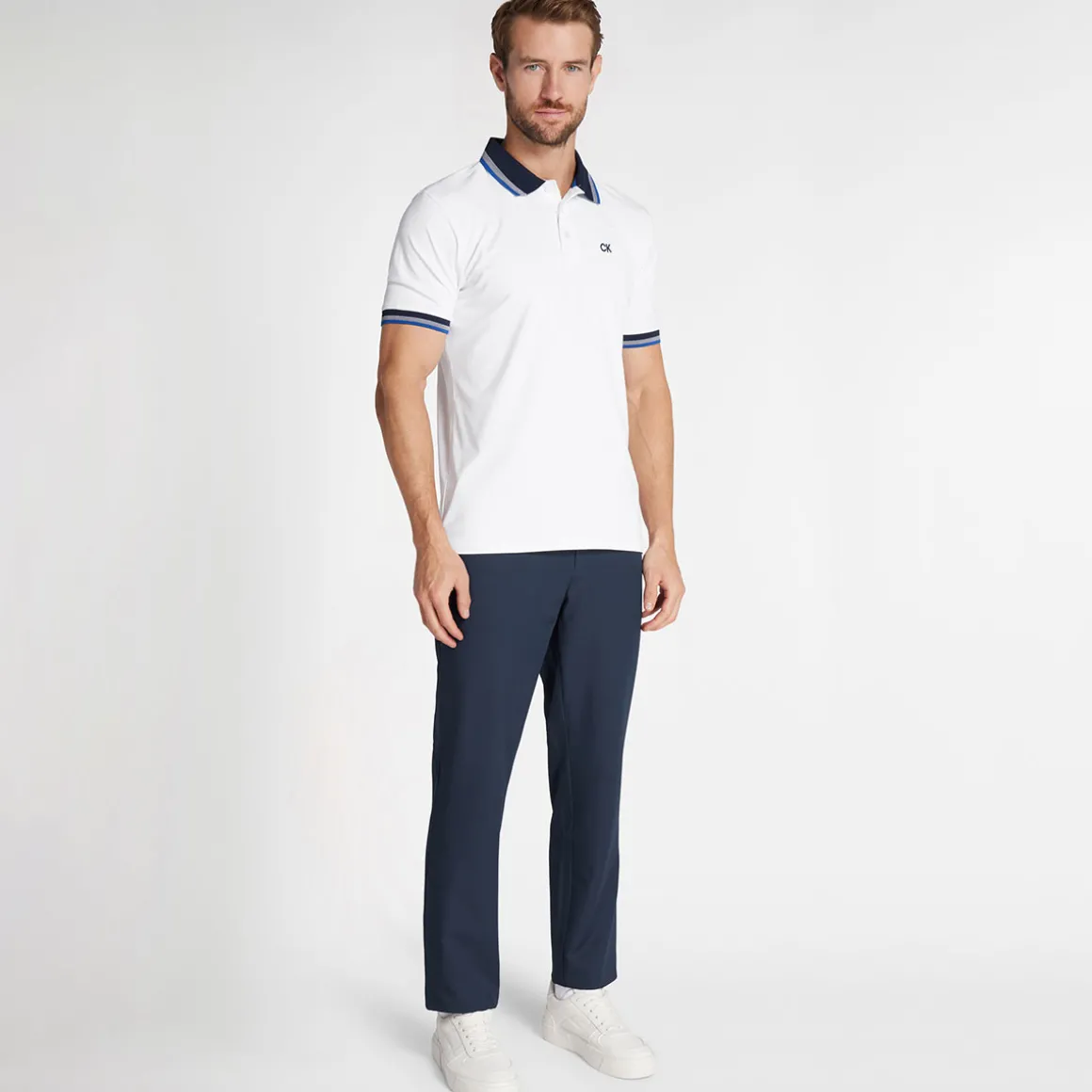 calvin_klein_mens_tech_je_3.webp Calvin Klein Men's Tech Jersey Golf Polo Shirt