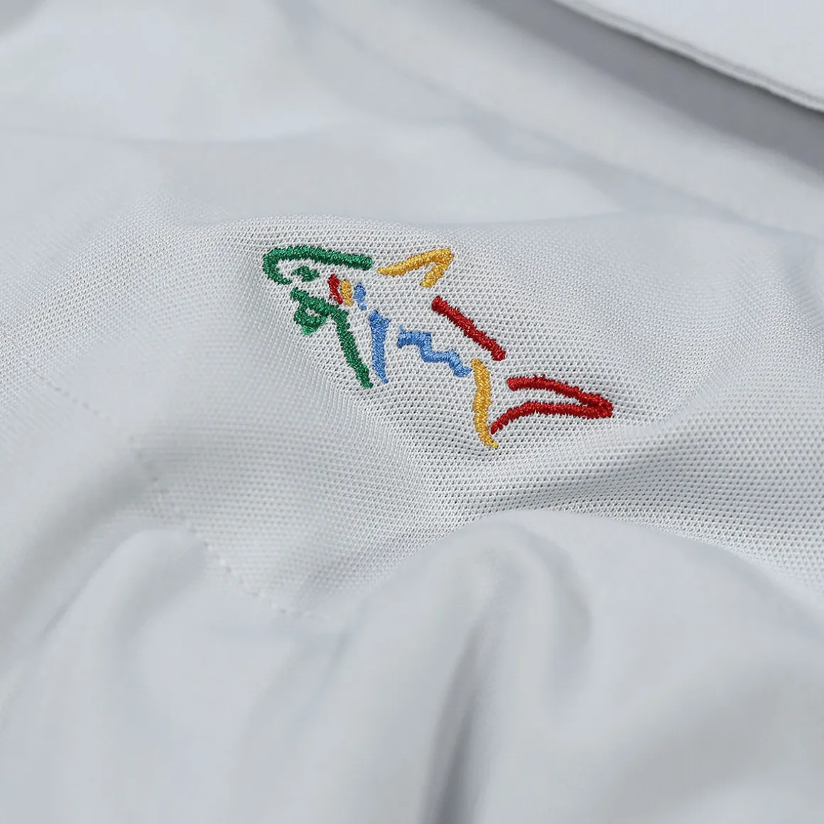greg_norman_mens_neck_log_15-2.webp Greg Norman Men's Neck Logo Stretch Golf Polo Shirt