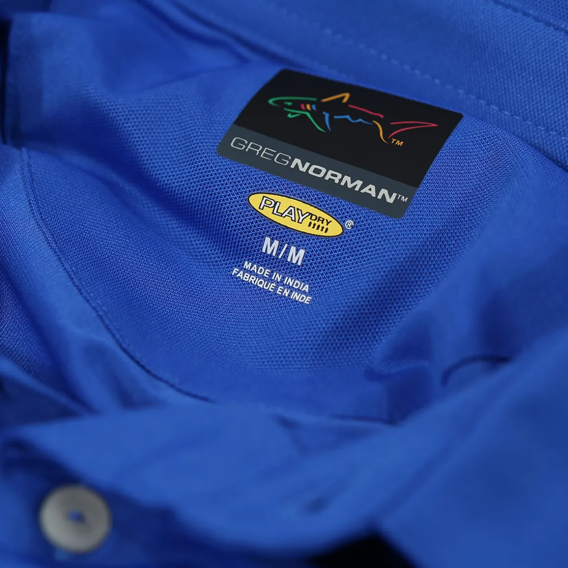 greg_norman_mens_neck_log_2-2.webp Greg Norman Men's Neck Logo Stretch Golf Polo Shirt