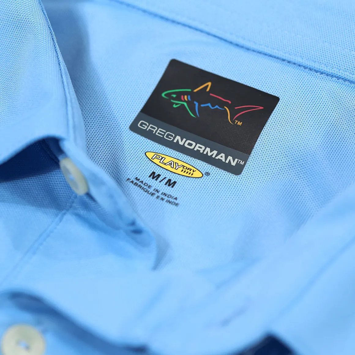 greg_norman_mens_neck_log_3-7.webp Greg Norman Men's Neck Logo Stretch Golf Polo Shirt