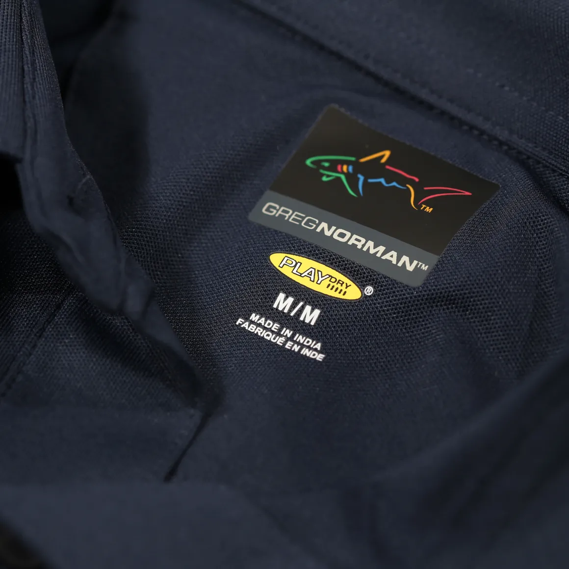 greg_norman_mens_neck_log_34-4.webp Greg Norman Men's Neck Logo Stretch Golf Polo Shirt