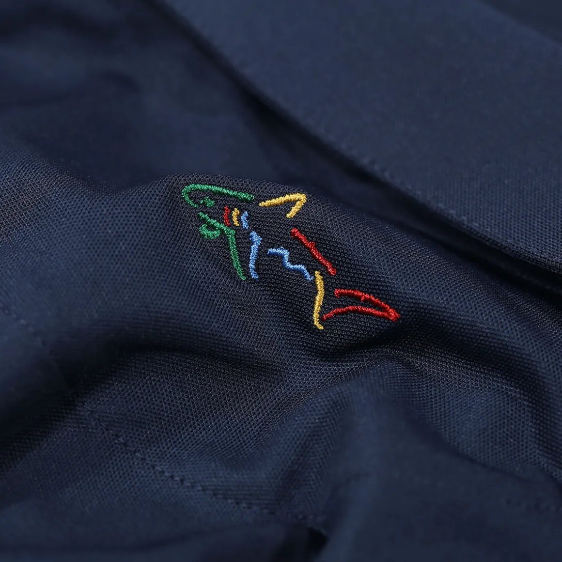 greg_norman_mens_neck_log_35-4.webp Greg Norman Men's Neck Logo Stretch Golf Polo Shirt