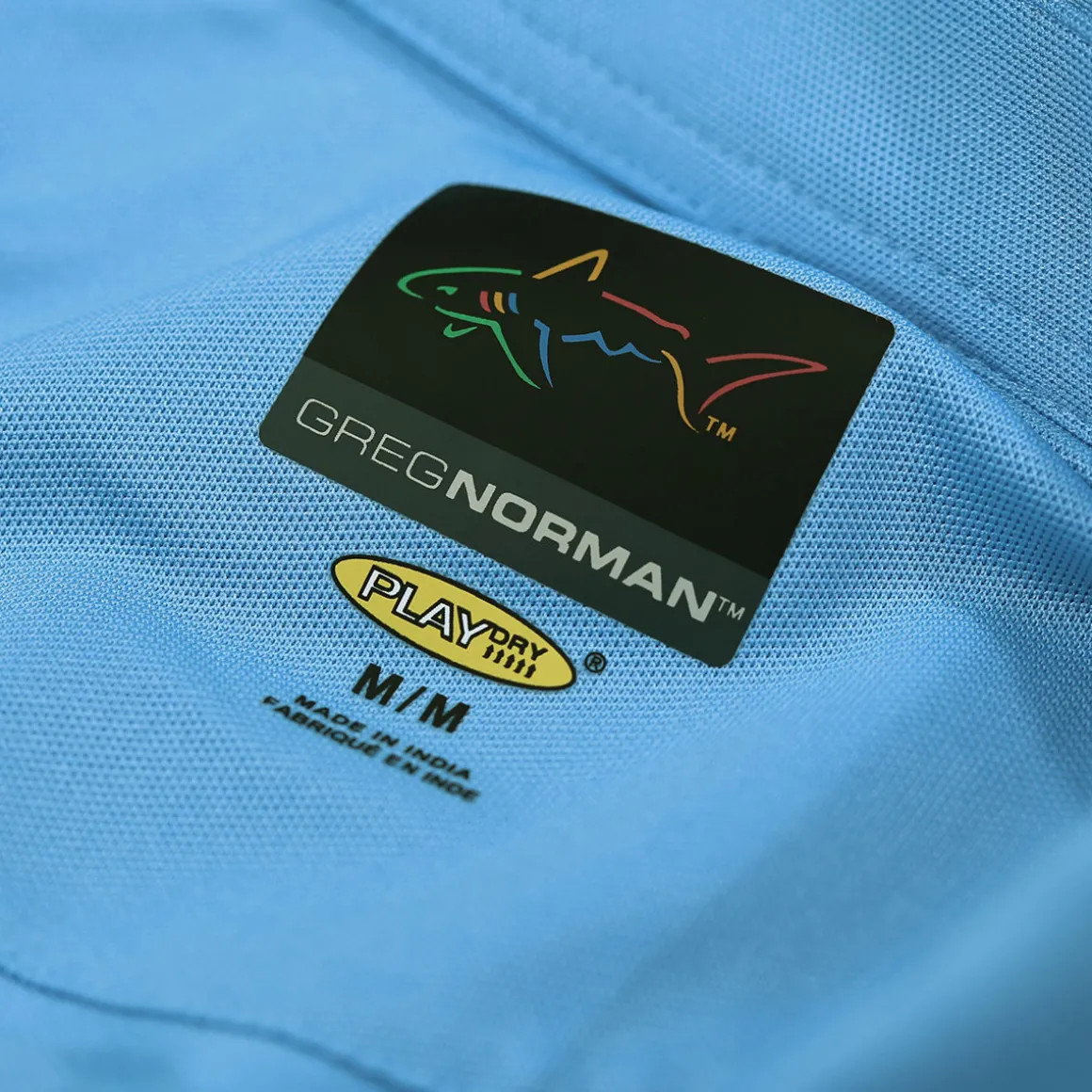 greg_norman_mens_shark_lo_12-1.webp Greg Norman Men's Shark Logo Golf Polo Shirt